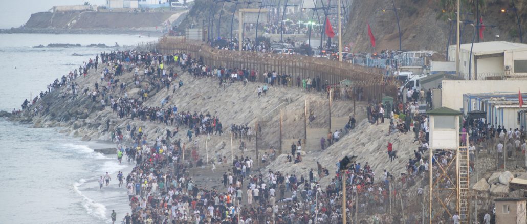 Why did nearly 60,000 migrants suddenly storm the border into Spain?